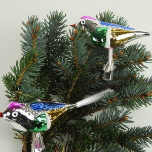 Fugle på kvist med clips og klare farver