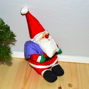 Lille blød polyester julemand med sæk