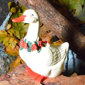 Peters jule serie mellem gæs med rød krans og sløjfe